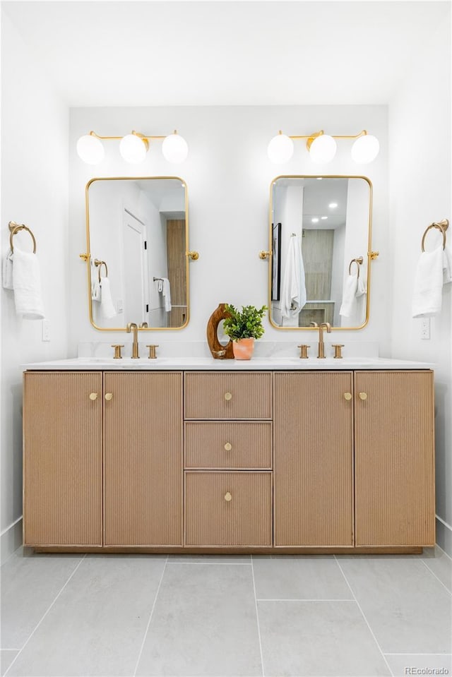 11010 W 29th Ave, Lakewood, CO 80215 - bathroom with double vanity and tile patterned flooring