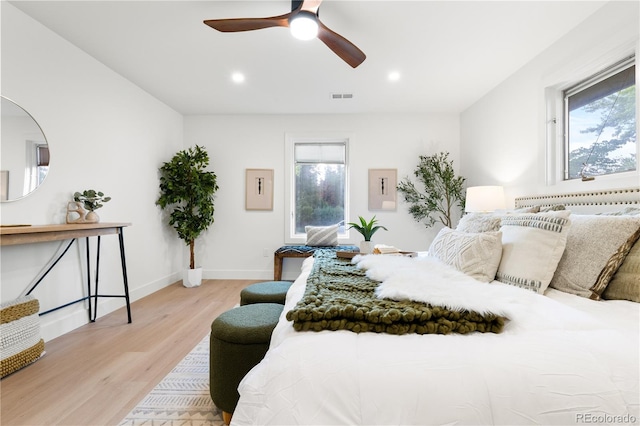 11010 W 29th Ave, Lakewood, CO 80215 - bedroom with light wood finished floors, recessed lighting, and ceiling fan