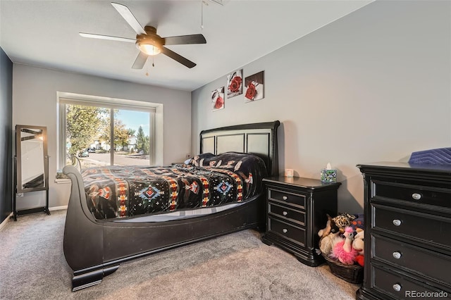 bedroom featuring light carpet and ceiling fan