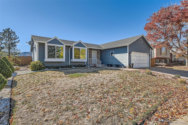 single story home featuring a garage