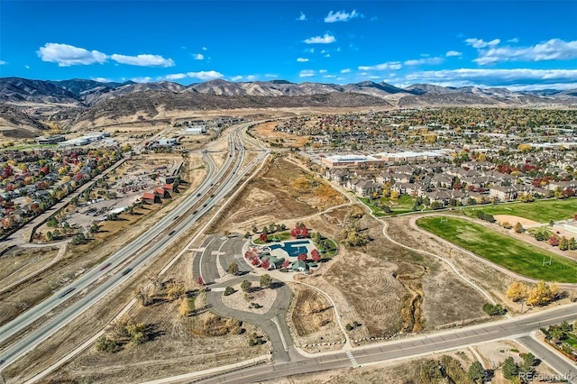 bird's eye view with a mountain view