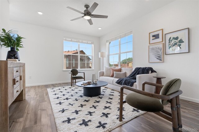 2140 Santini Trl Unit F, Littleton, CO 80129 - living room with ceiling fan, wood finished floors, baseboards, and recessed lighting