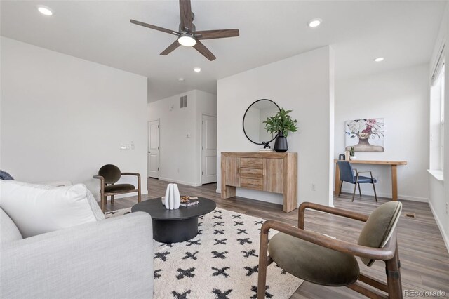 2140 Santini Trl Unit F, Littleton, CO 80129 - living room featuring wood finished floors, recessed lighting, a ceiling fan, and baseboards
