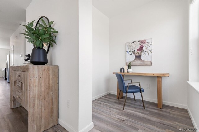 2140 Santini Trl Unit F, Littleton, CO 80129 - office area with wood finished floors and baseboards