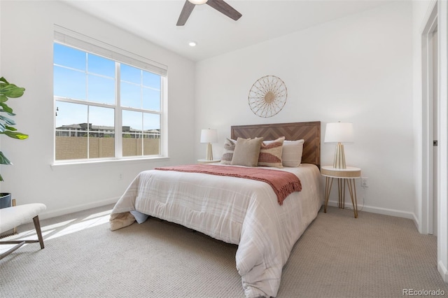 2140 Santini Trl Unit F, Littleton, CO 80129 - bedroom with carpet floors, baseboards, and ceiling fan