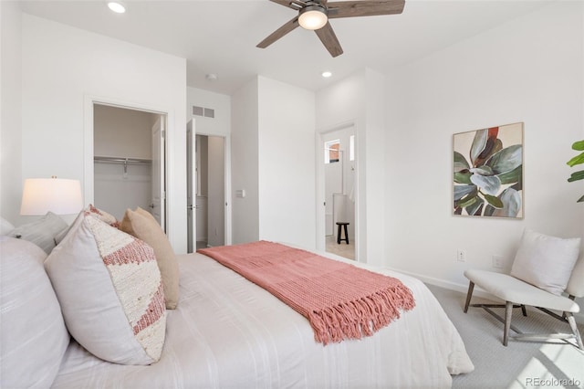 2140 Santini Trl Unit F, Littleton, CO 80129 - carpeted bedroom with recessed lighting, baseboards, a ceiling fan, a closet, and a spacious closet