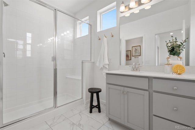 2140 Santini Trl Unit F, Littleton, CO 80129 - full bath with a stall shower, vanity, and marble finish flooring