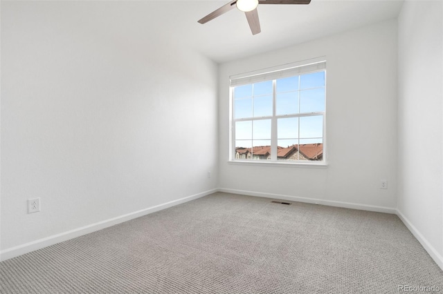 2140 Santini Trl Unit F, Littleton, CO 80129 - empty room with ceiling fan, light colored carpet, and baseboards