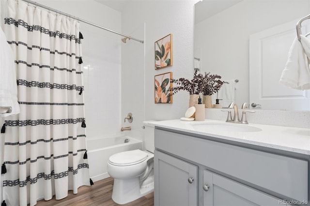 2140 Santini Trl Unit F, Littleton, CO 80129 - full bath featuring vanity, wood finished floors, toilet, and shower / bath combination with curtain
