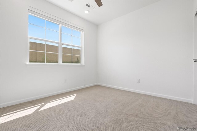 2140 Santini Trl Unit F, Littleton, CO 80129 - empty room with light colored carpet, ceiling fan, and baseboards