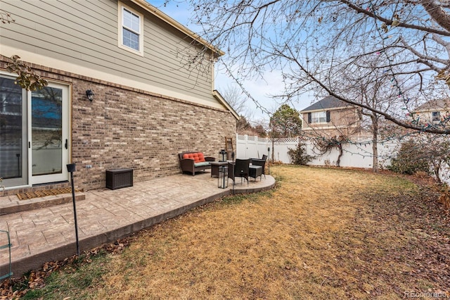 view of yard featuring a patio and a fenced backyard