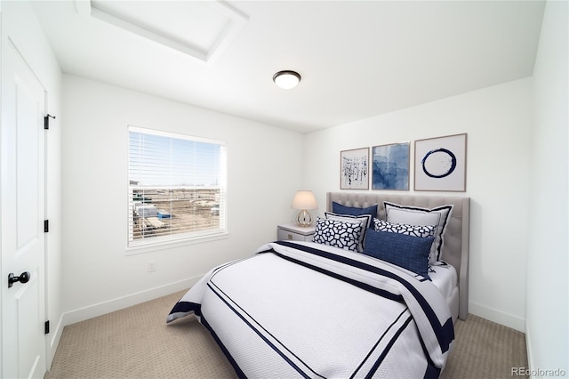 bedroom with light colored carpet