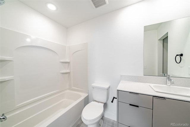 full bathroom with vanity, shower / washtub combination, and toilet