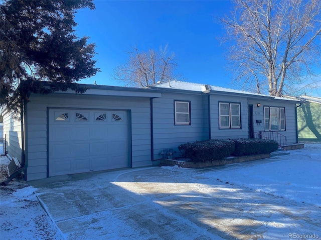 view of front of house featuring a garage and driveway