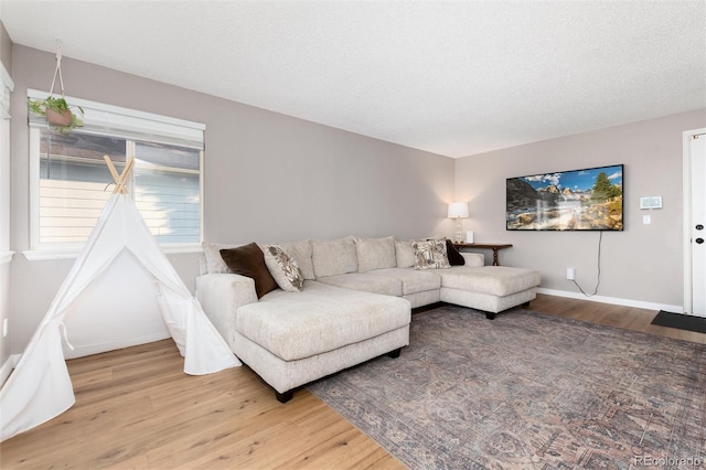 4304 S Genoa Ct, Centennial, CO 80015 - living area with wood finished floors and baseboards