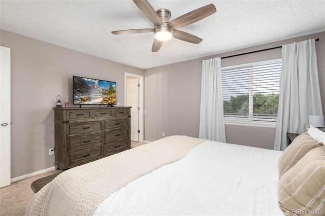 4304 S Genoa Ct, Centennial, CO 80015 - bedroom featuring light carpet, ceiling fan, and a textured ceiling