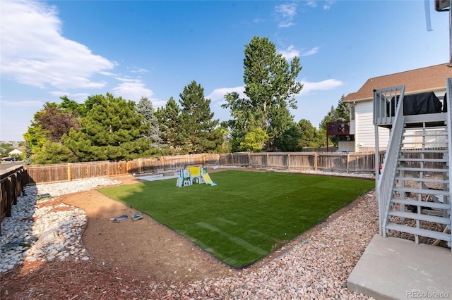 4304 S Genoa Ct, Centennial, CO 80015 - fenced backyard with stairs and a wooden deck