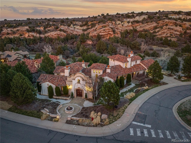 view of aerial view at dusk