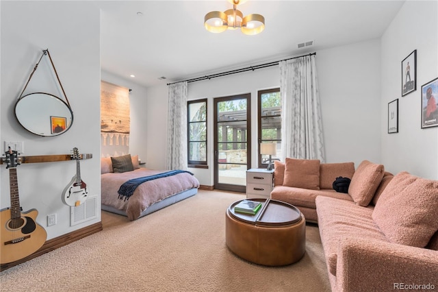 bedroom with carpet flooring, a chandelier, and access to exterior