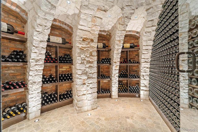 7944 Dante Dr, Littleton, CO 80125 - wine room featuring stone finish flooring
