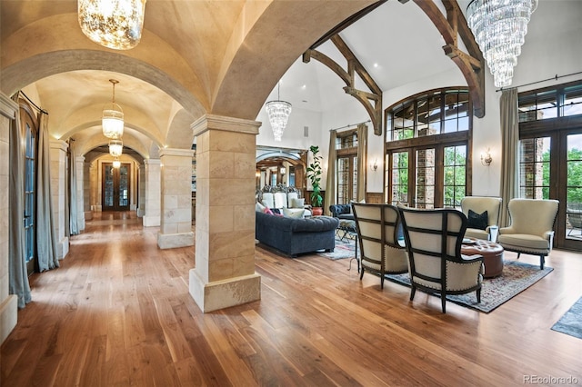 lobby with high vaulted ceiling and recessed lighting