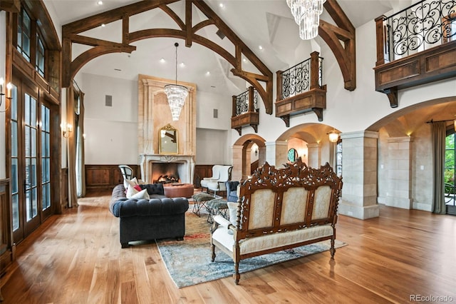 building lobby featuring high vaulted ceiling, recessed lighting, and beamed ceiling