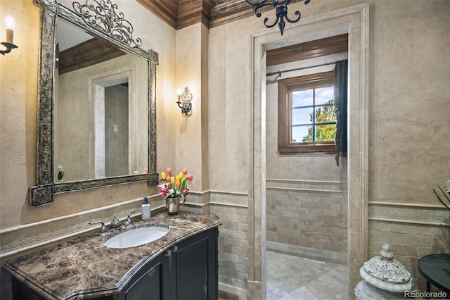 bathroom with vanity and crown molding
