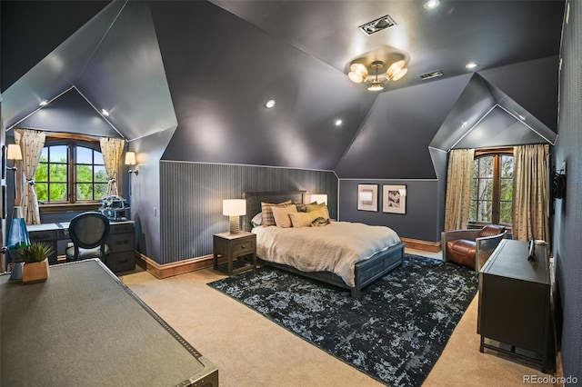 bedroom with carpet flooring, vaulted ceiling, and baseboards