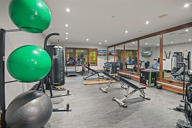 workout area featuring recessed lighting