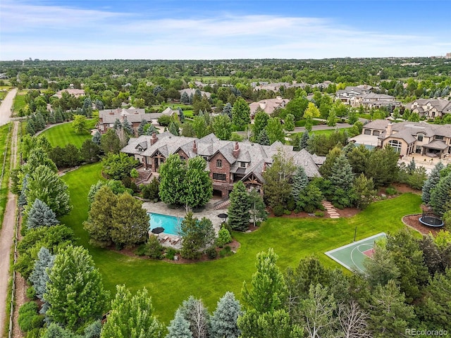 aerial view of residential area featuring a pool area
