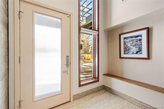 doorway to outside with light hardwood / wood-style flooring