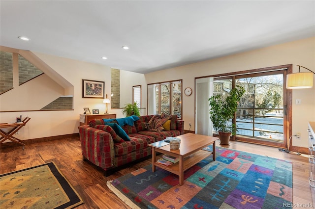 living room with dark hardwood / wood-style flooring