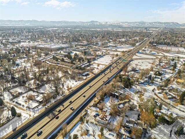 birds eye view of property featuring a mountain view