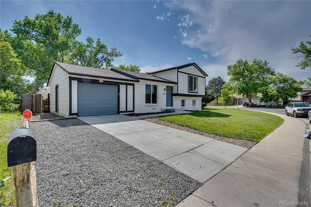 9605 Carr St, Broomfield, CO 80021 - split level home with concrete driveway and an attached garage