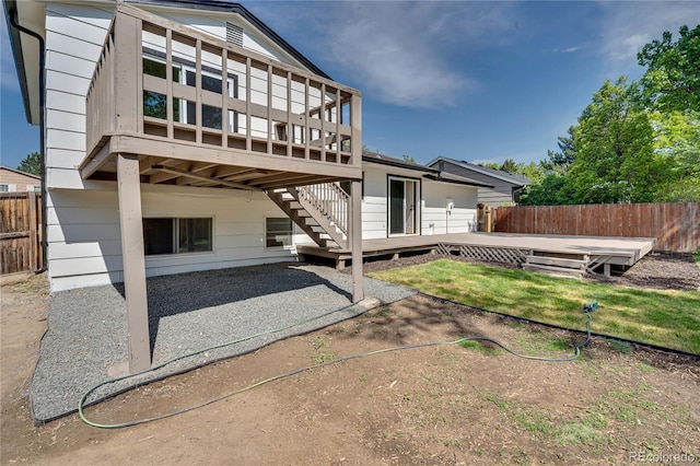 9605 Carr St, Broomfield, CO 80021 - back of property with a wooden deck and a patio