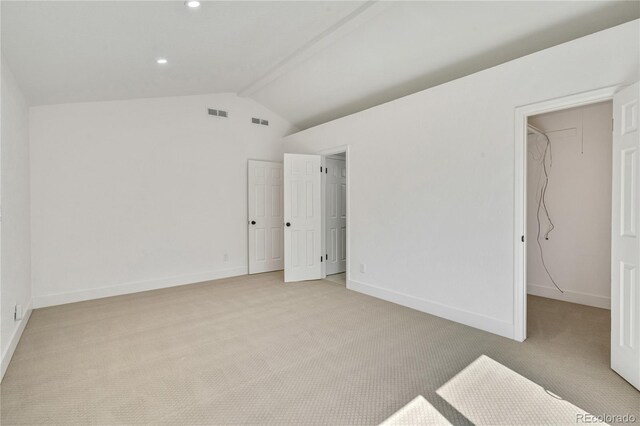 9605 Carr St, Broomfield, CO 80021 - unfurnished bedroom with light colored carpet, baseboards, a walk in closet, and recessed lighting