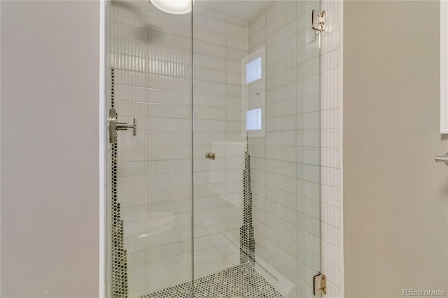 bathroom featuring walk in shower