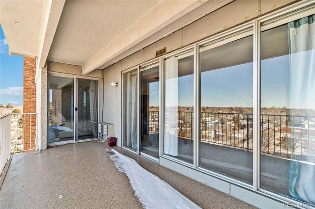 view of patio / terrace with a balcony