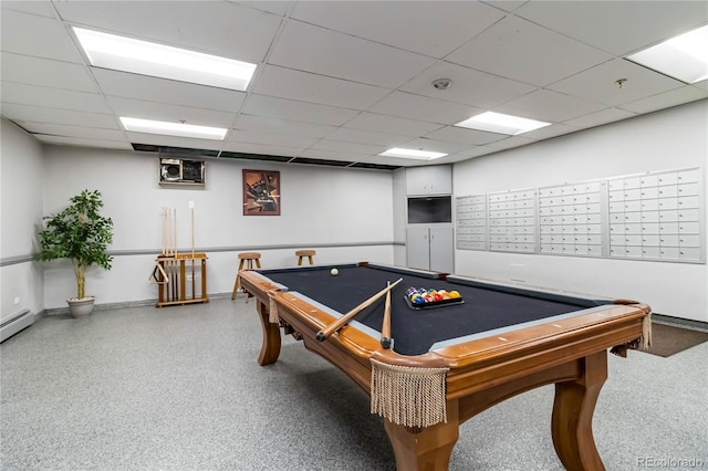 rec room featuring a paneled ceiling and a mail area