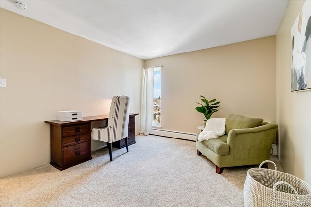 home office featuring light colored carpet and a baseboard heating unit