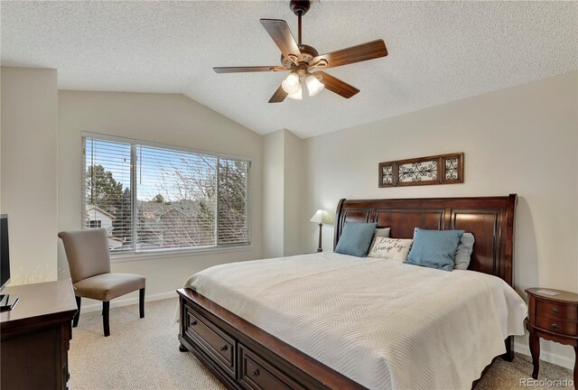 21541 Unbridled Ave, Parker, CO 80138 - bedroom with light colored carpet, vaulted ceiling, baseboards, a ceiling fan, and a textured ceiling