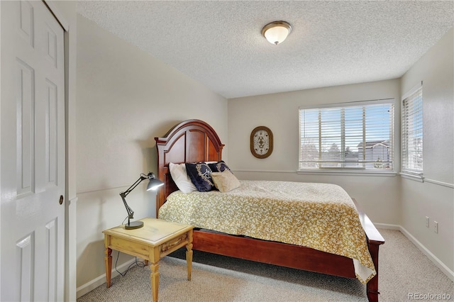 21541 Unbridled Ave, Parker, CO 80138 - carpeted bedroom with a textured ceiling and baseboards