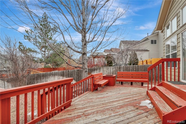 21541 Unbridled Ave, Parker, CO 80138 - wooden deck featuring a fenced backyard