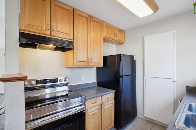 kitchen featuring light tile patterned floors, sink, black fridge, and stainless steel electric range