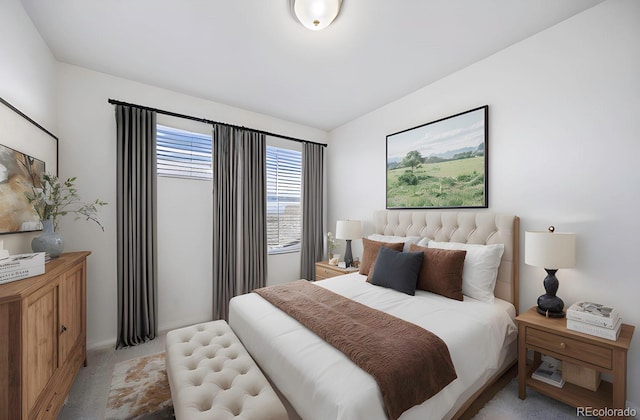 bedroom with light colored carpet