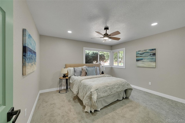 1596 S Stuart St, Denver, CO 80219 - bedroom with recessed lighting, light colored carpet, a textured ceiling, and ceiling fan