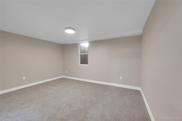 1596 S Stuart St, Denver, CO 80219 - carpeted spare room featuring baseboards
