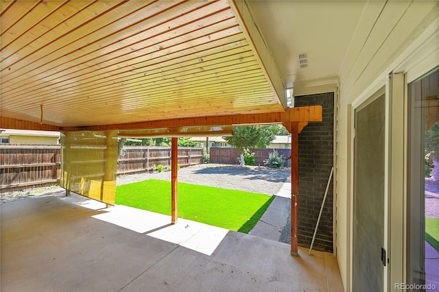 1596 S Stuart St, Denver, CO 80219 - fenced backyard with a patio