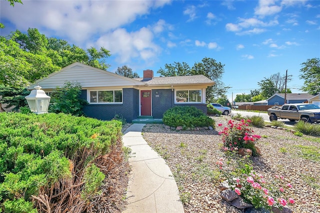 1596 S Stuart St, Denver, CO 80219 - single story home with a chimney