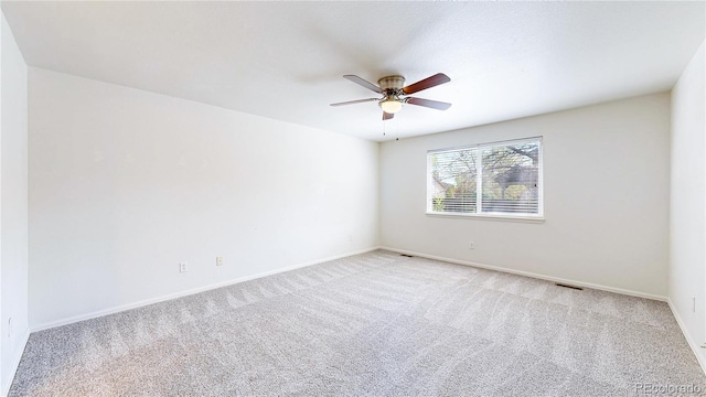 2314 Flagstaff Dr, Longmont, CO 80504 - spare room featuring a ceiling fan, carpet, and baseboards